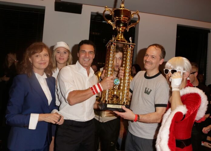 Shortz with actress Susan Sarandon, Andre Balazs and professional table tennis players Adam Bobrow and Kazuyuki Yokoyama in December 2012. Shortz calls table tennis one of his 