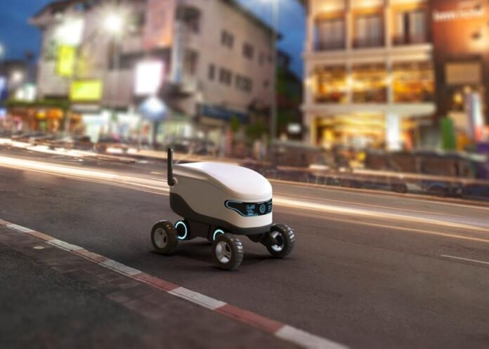 A delivery robot on a city street.